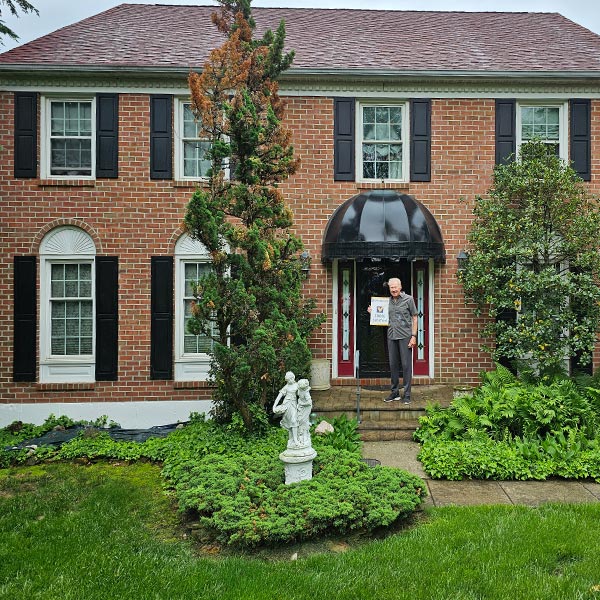 white double hung windows and black entry door with decorative sidelites in conshohocken pa - 100% Satisfied